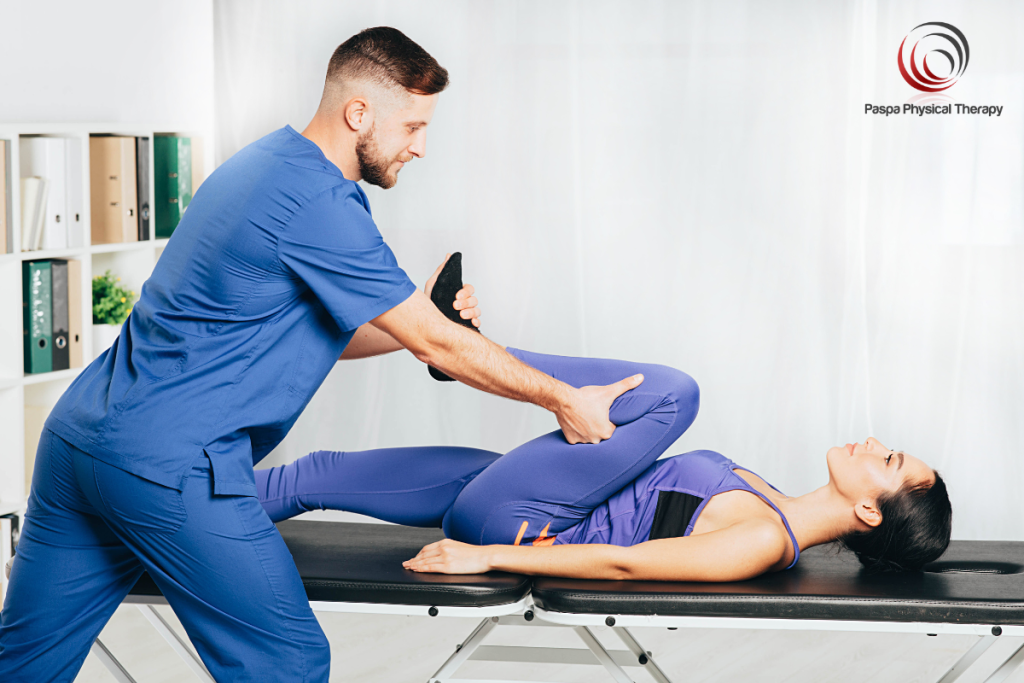 A runner improving hip flexibility with a physical therapist in preparation for a marathon in Manhattan.