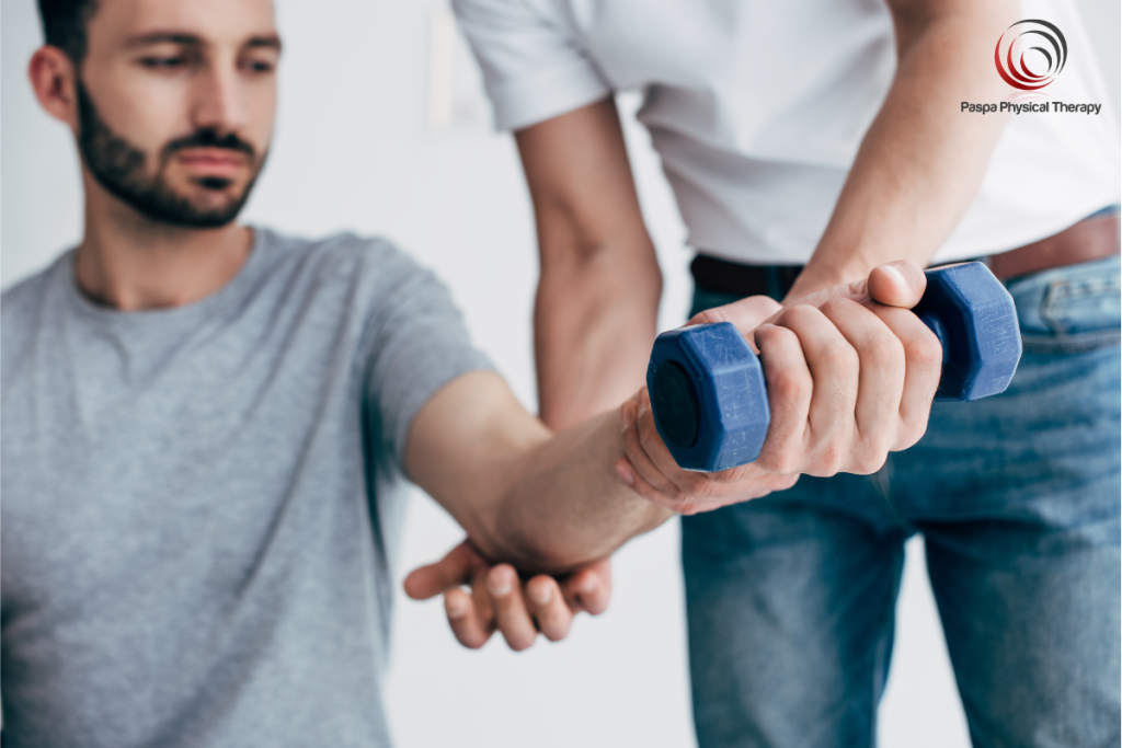 A patient doing wrist curls during physical therapy for a sprained wrist in Manhattan, New York.